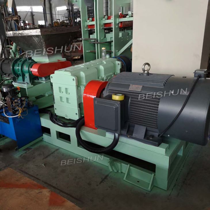 Double-arm fed rubber strainer (2)