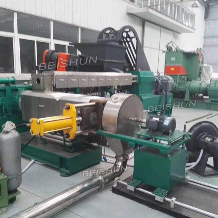 Double-arm fed rubber strainer (3)